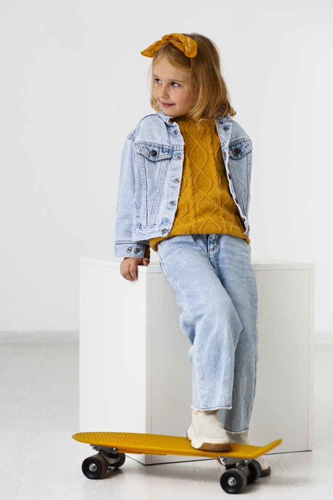 full shot girl studio with skateboard